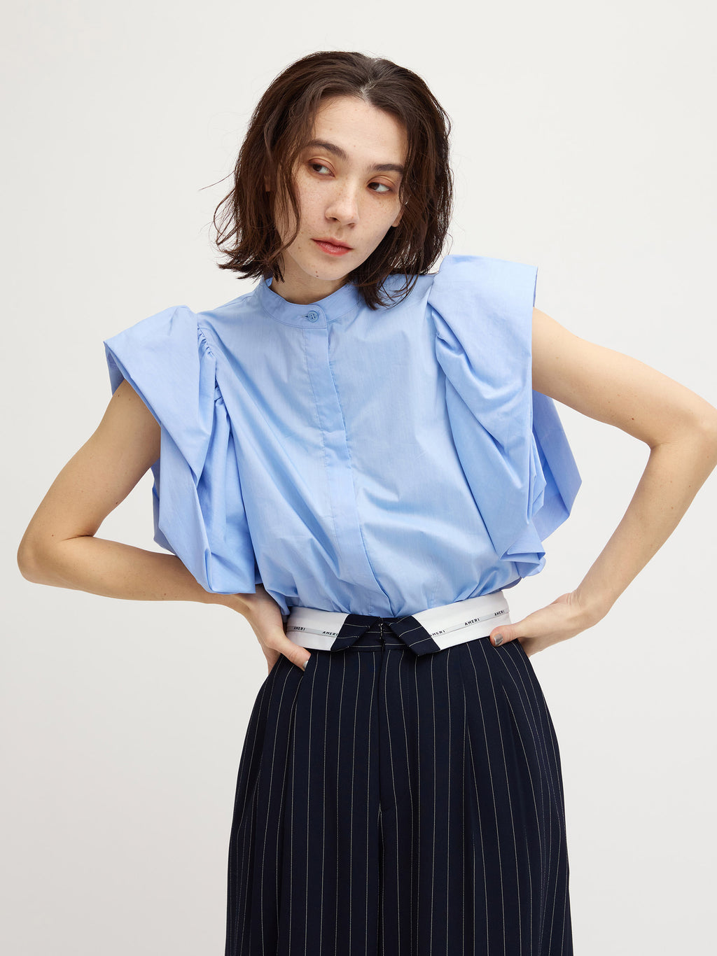 PETAL SLEEVE COMPACT BLOUSE