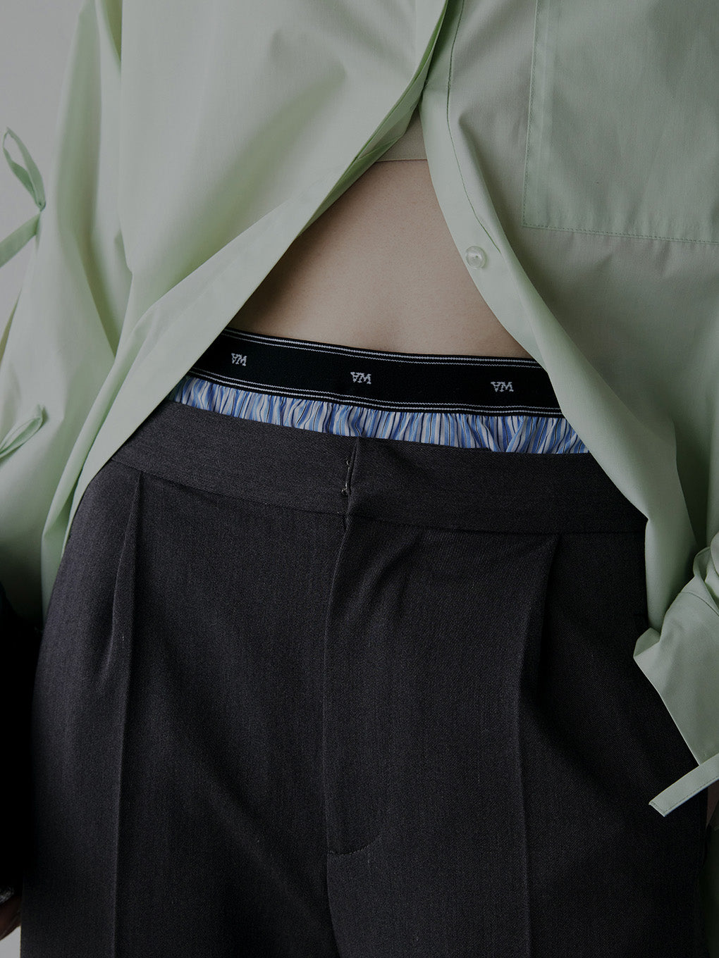 LOGO TAPE TRUNKS LAYERED PANTS