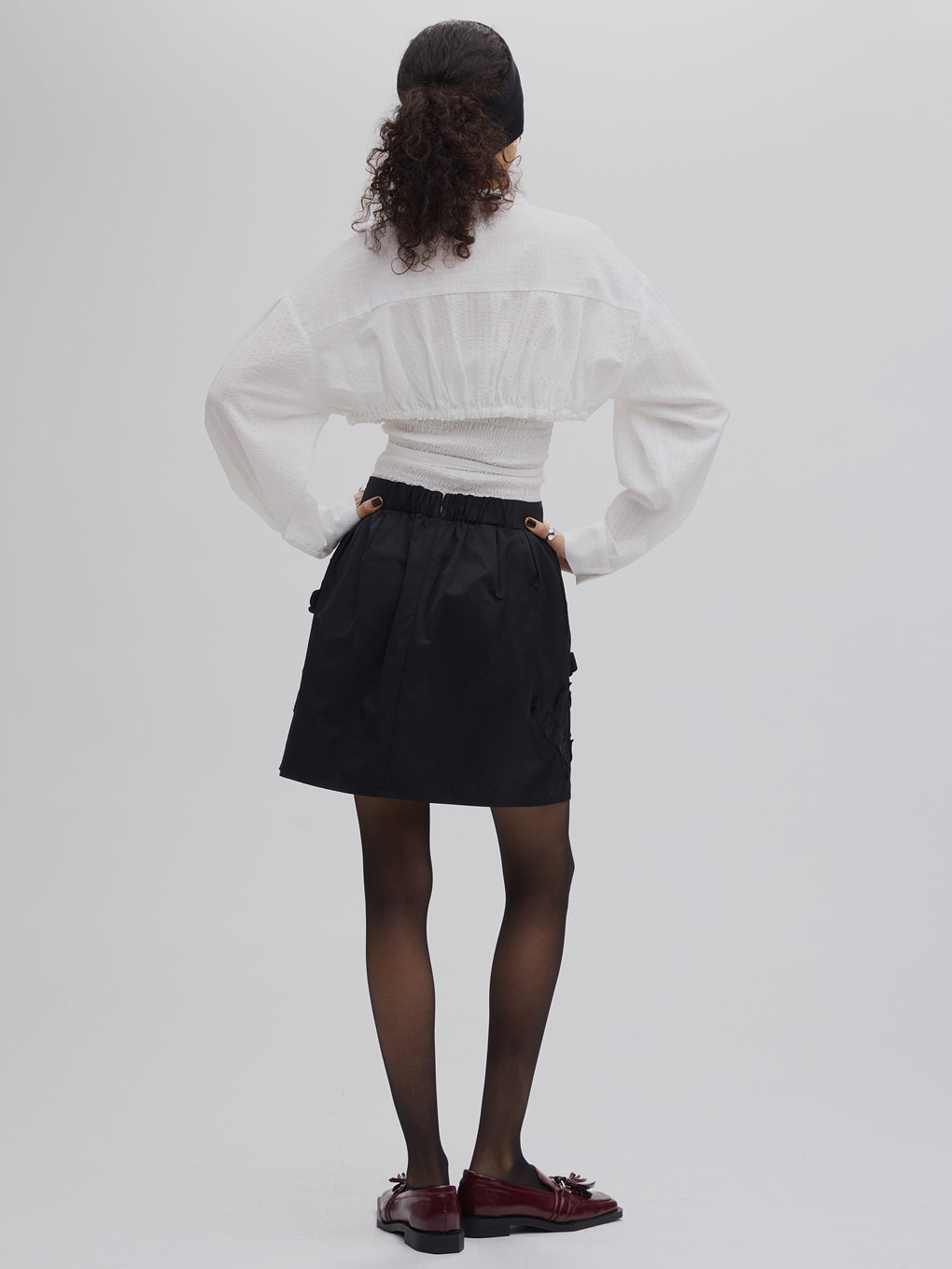 UND FLOUR MOTIF MINI SKIRT