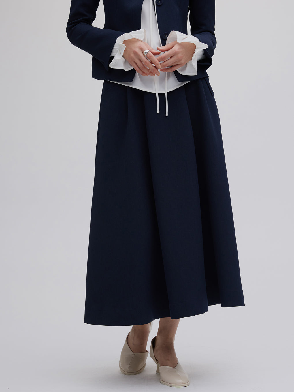 BELT SET TUCK FLARE SKIRT