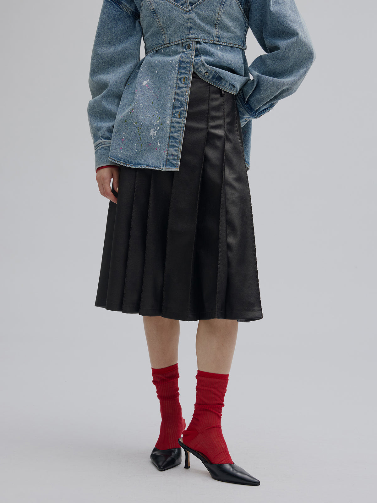 PLEATS MEDIUM SYNTHETIC LEATHER SKIRT