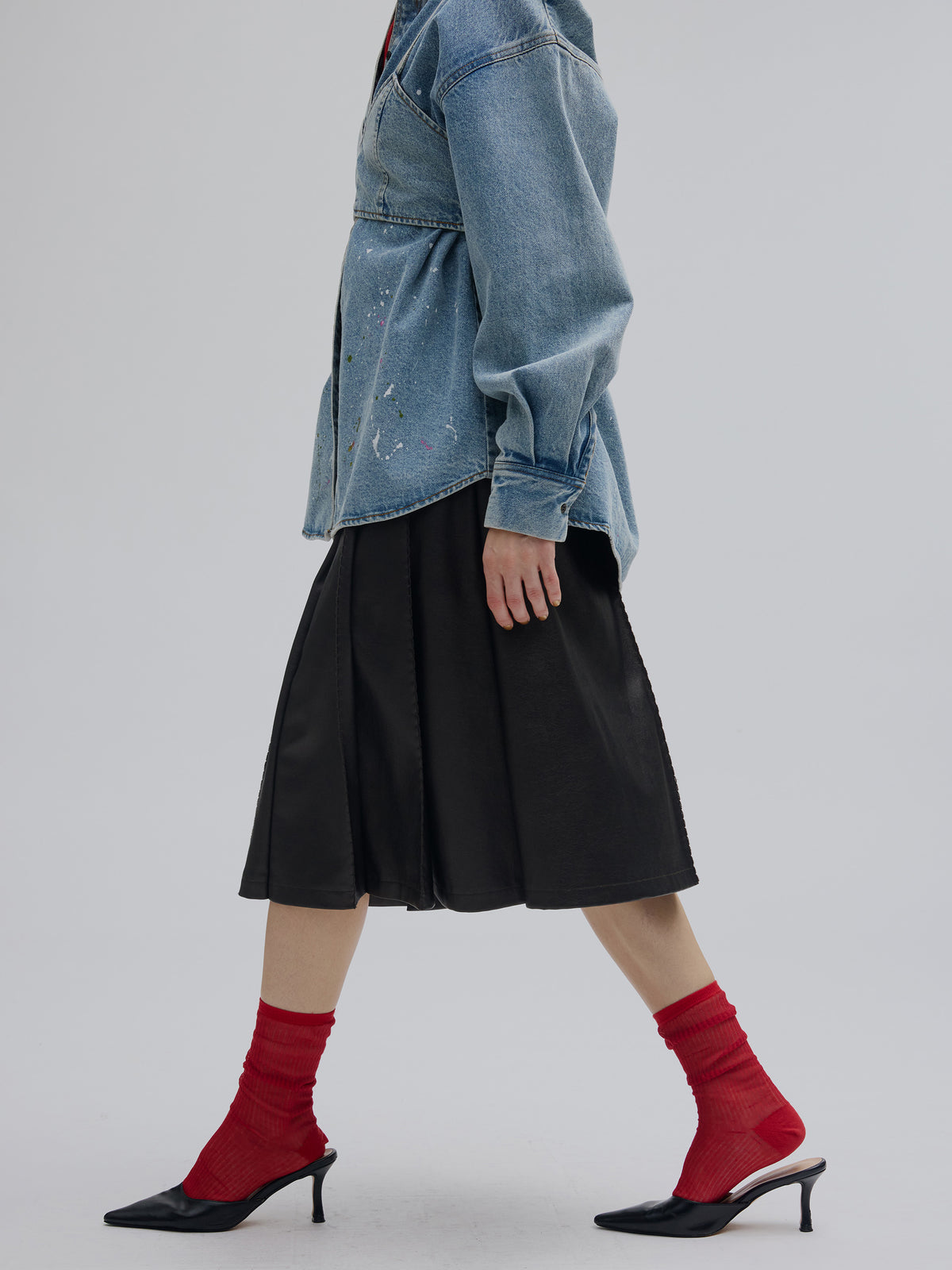 PLEATS MEDIUM SYNTHETIC LEATHER SKIRT