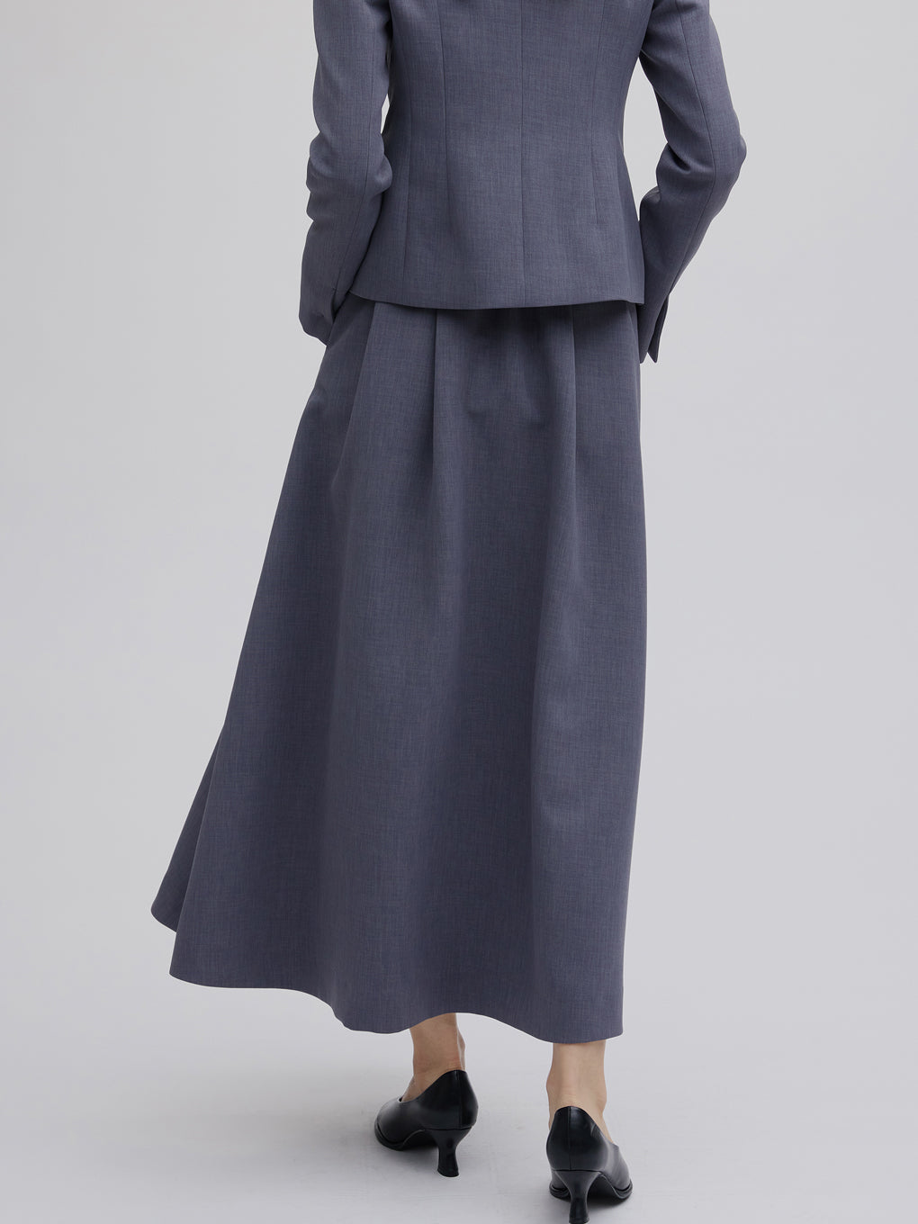 BELT SET TUCK FLARE SKIRT