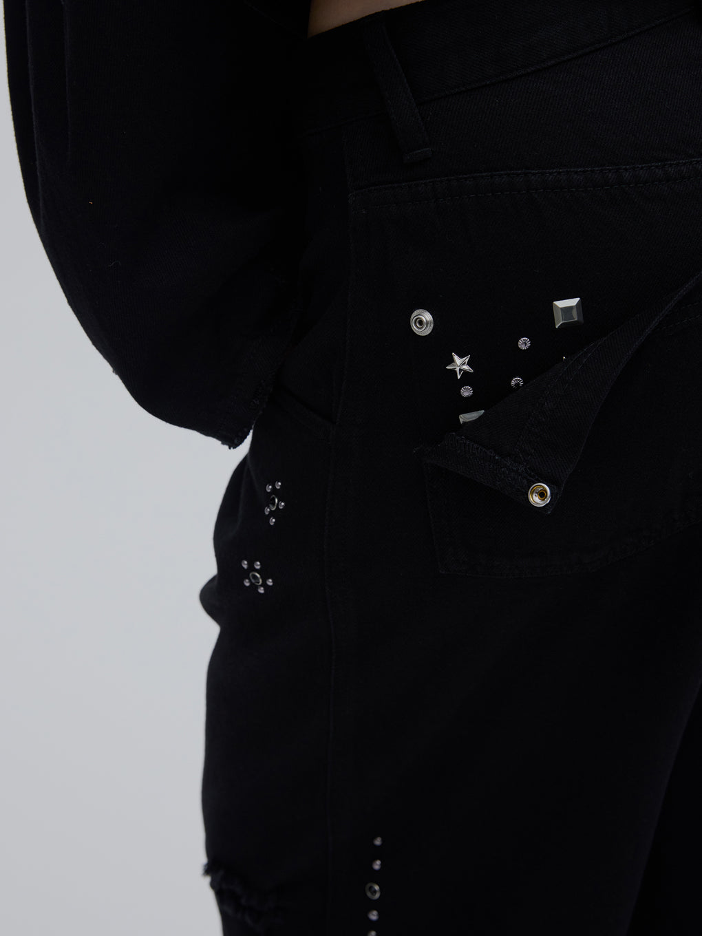 TATTOO STUDS DENIM PANTS