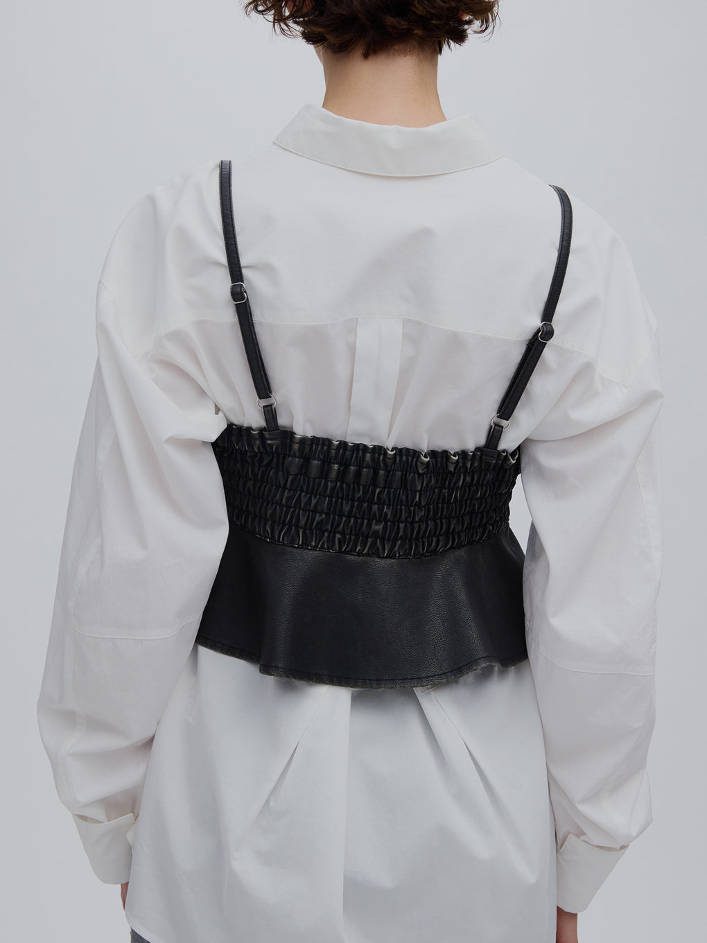 STUDS PEPLUM SYNTHETIC LEATHER BUISTIER