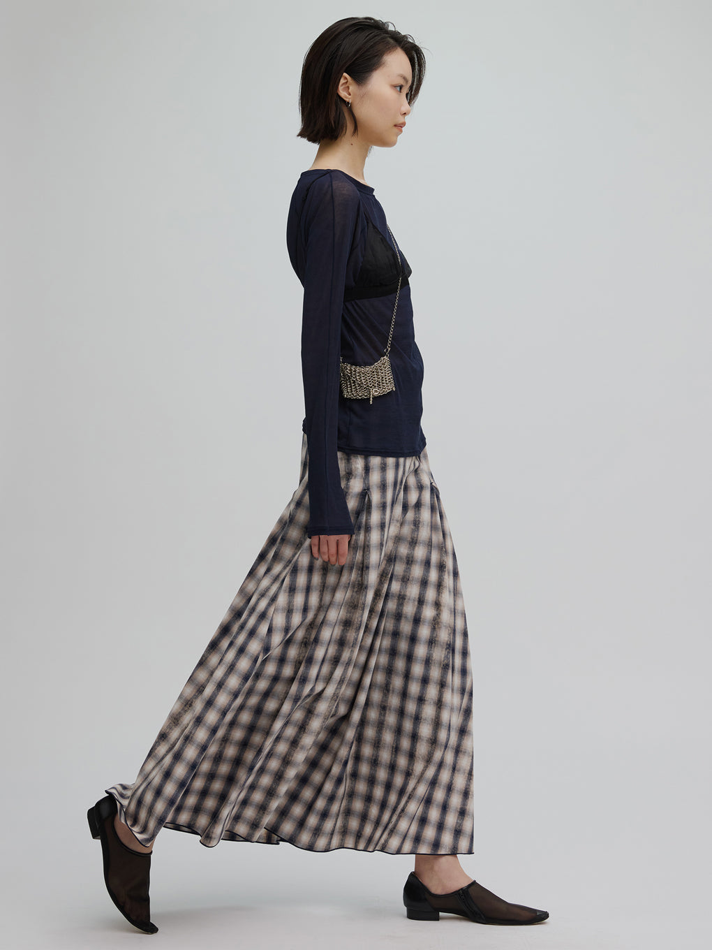 UNEVEN CHECK SPIRAL SKIRT