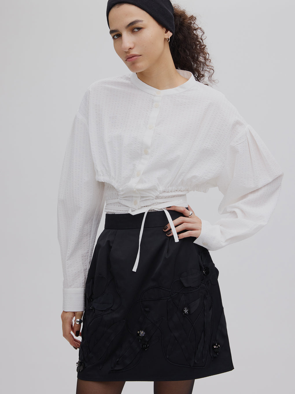 UND FLOUR MOTIF MINI SKIRT