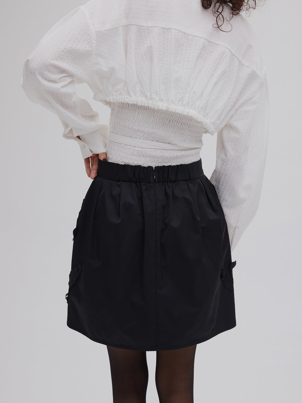 UND FLOUR MOTIF MINI SKIRT