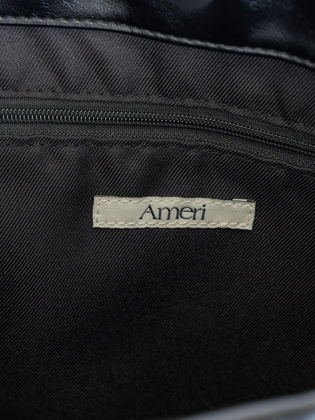 METAL MOTIF LEATHER BAG