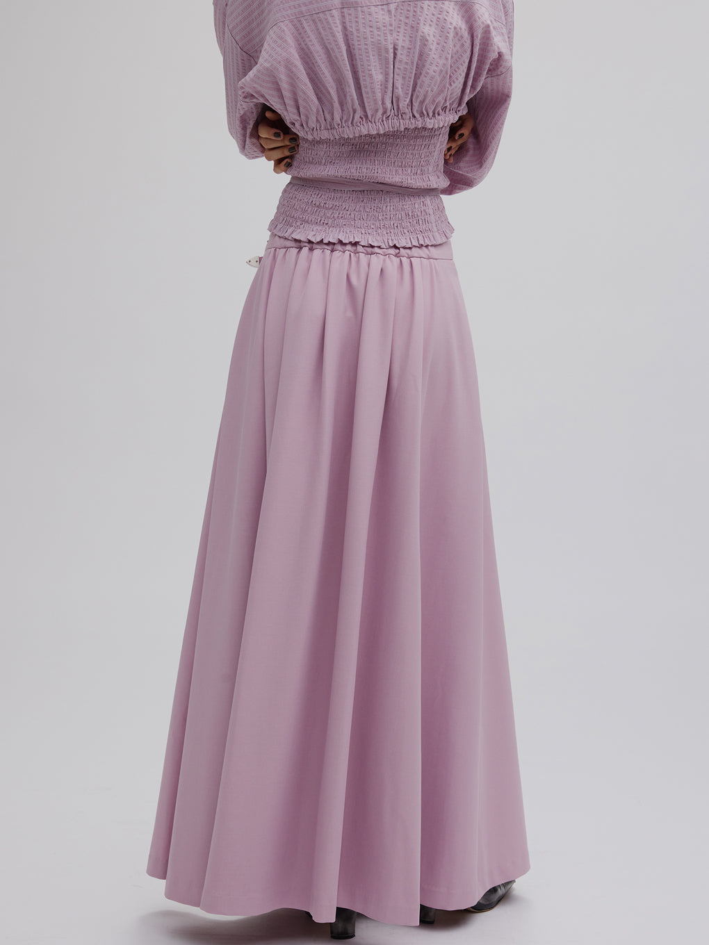 UND RANDOM TUCK FLARE SKIRT